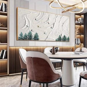 SNOWY PEAKS textured minimalist winter art with skiers on a white mountain, gold framed painting, lifestyle setting.