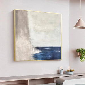 SERENE SHORE minimalist abstract coastal painting by Javier Ramirez, blue and beige tones, gold frame, modern home decor