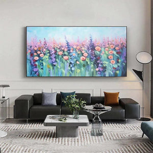 Elodie Dubois' Pastel Meadow artwork over black sofa, showing large scale in modern living room design.
