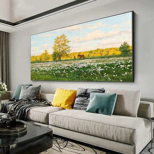 Large Sunlit Meadow painting with white flowers, golden tree, horse, and figure, styled above a modern sofa.