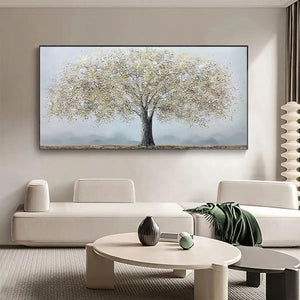 Golden Tree painting by Javier Ramirez, textured gold and white art for modern home decor, above a white sofa