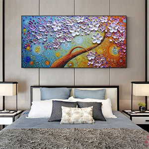 Lilac Dream original textured floral painting with white blossoms and colorful swirled background, displayed above bed.