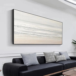 Tranquil Coast minimalist coastal landscape painting by Liam O'Connell in a modern living room, neutral tones and framed art.