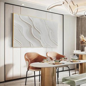 Serene Ripples textured white abstract art, gold frame, prominent impasto waves in a sophisticated modern dining room.