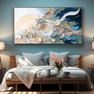 OCEANIC BLOOM abstract painting by Willow Davies, framed above a bed, blue, beige, and gold tones. Modern interior art.