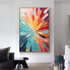 Radiant impasto abstract painting with bold, vibrant strokes in a gold frame, enhancing a modern living room.