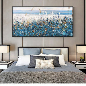 Blue Dunes coastal painting with blue flowers in a modern bedroom, showcasing its scale and decor.