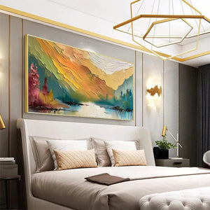 Autumn Valley impasto landscape painting in gold frame over bed in modern luxury bedroom.