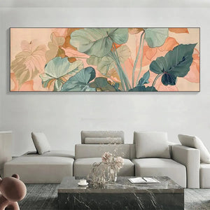 Panoramic botanical painting of teal and sage green tropical leaves on peach background in a living room setting.