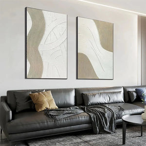 Textured White Lines Diptych: 2 minimalist paintings with raised beige & white lines in a living room.