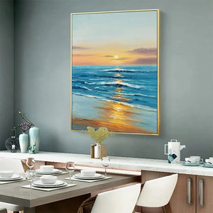 Vertical oil painting of Sunkissed Shores sunset over blue ocean waves with golden light on sand, displayed in a dining room.