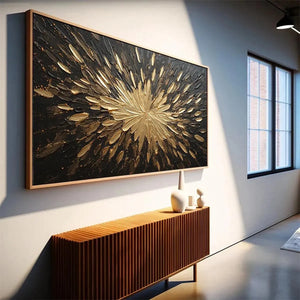 Golden Burst horizontal abstract painting with impasto gold texture on black, displayed in modern interior