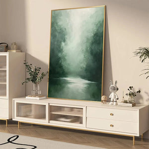Misty Green Forest vertical wall art by Liam O'Connell, framed in gold, green forest landscape for home decor.