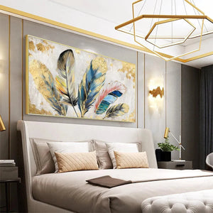Panoramic feather painting with gold leaf accents, gold, blue, teal, pink, yellow, displayed in bedroom.