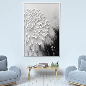 Vertical impasto painting of a dimensional white bloom on textured black and gray background, framed art for living room