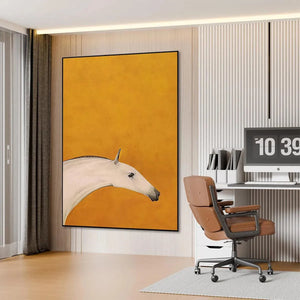 White horse painting by Javier Ramirez on yellow background. Vertical wall art for modern home decor. Office interior.