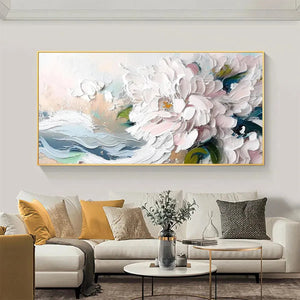 Textured impasto painting of white peonies with pink accents, displayed above a neutral sofa, enhancing room decor.
