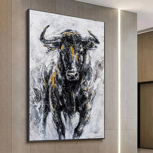 Textured painting of charging bull with black, white, and gold accents by Ethan Walker, vertical wall art for home decor.