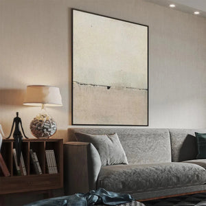 Javier Ramirez's Minimalist Earthscape vertical abstract painting in a modern living room, neutral tones.