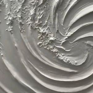 Close-up of Isabella Rossi's 'WHIRLWIND' textured white abstract painting, showing thick impasto swirl detail.
