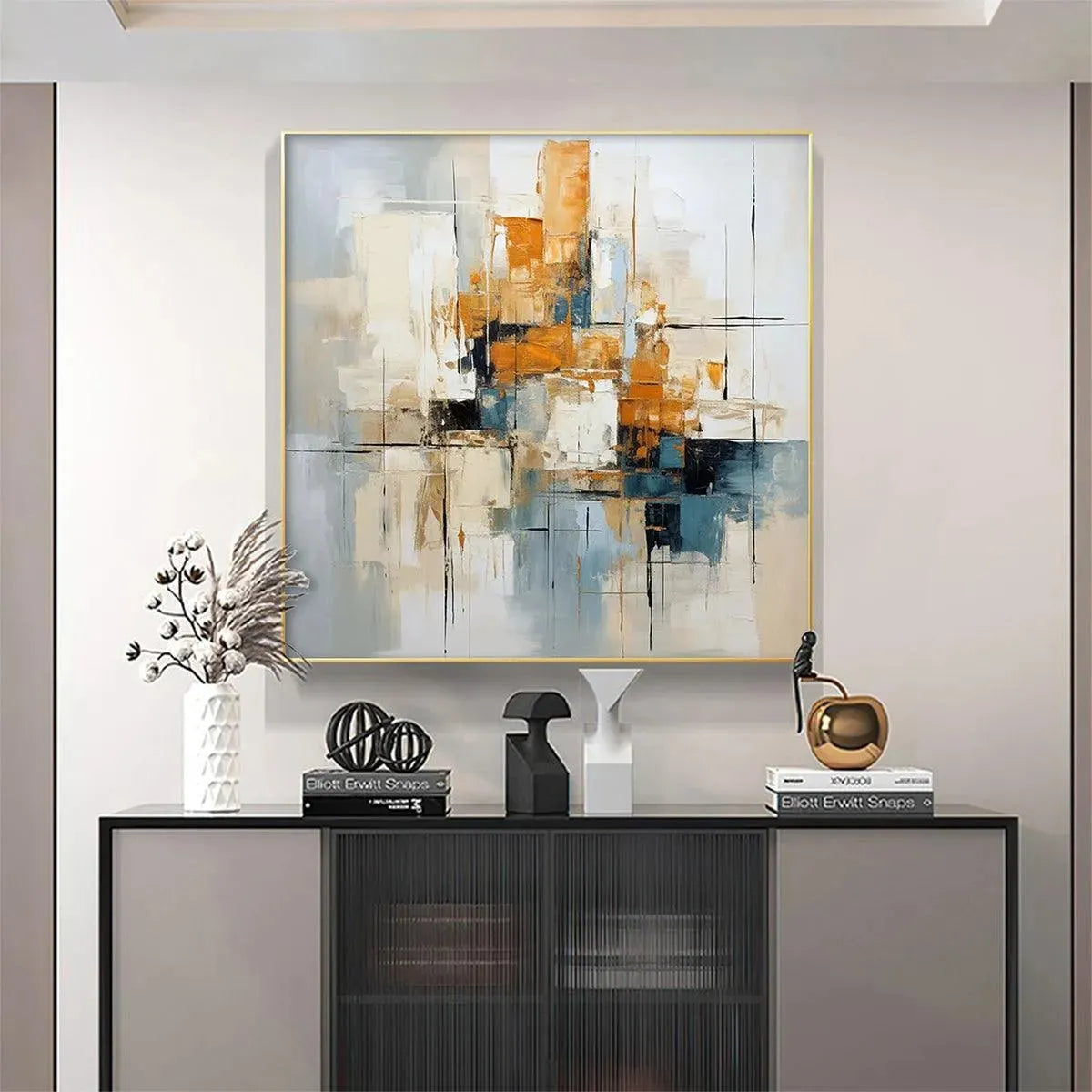 Abstract Cityscape painting by Javier Ramirez, featuring orange, blue, and neutral colors, framed geometric wall art.