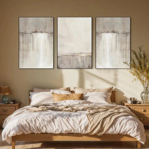 Abstract waterfall triptych: 3 minimalist paintings with beige, grey, white tones and gold frames.