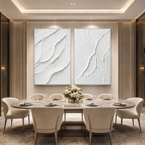 Minimalist white textured Wabi Sabi wall art set above a luxury dining table