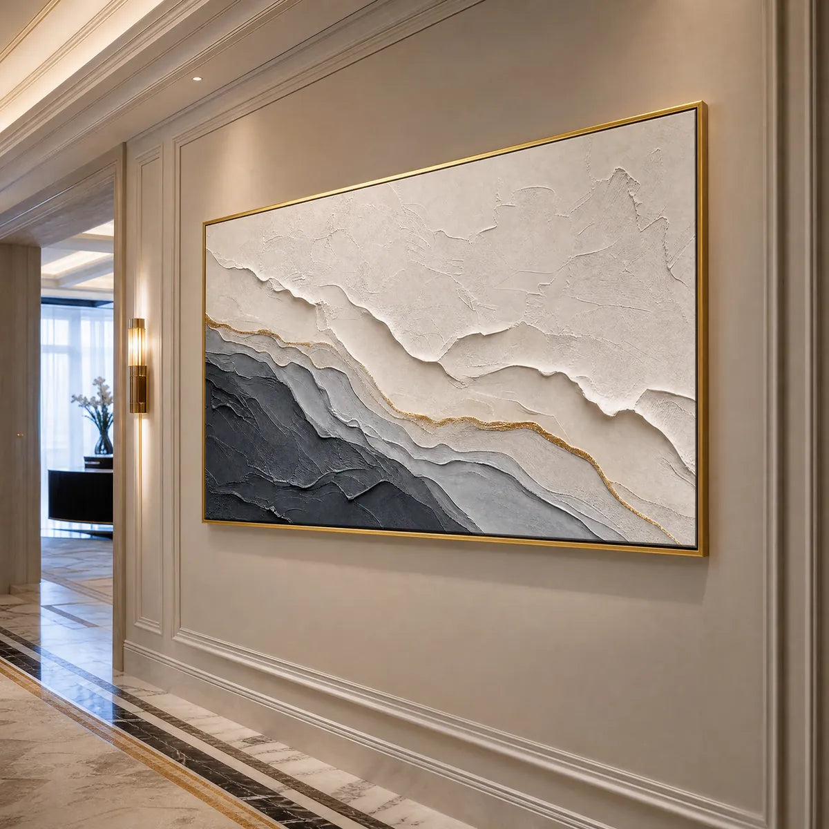 Textured grey and white abstract landscape painting with gold accents in gold frame