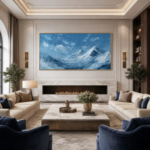 ALPINE ECHO textured mountain landscape painting in blue and white, framed above fireplace