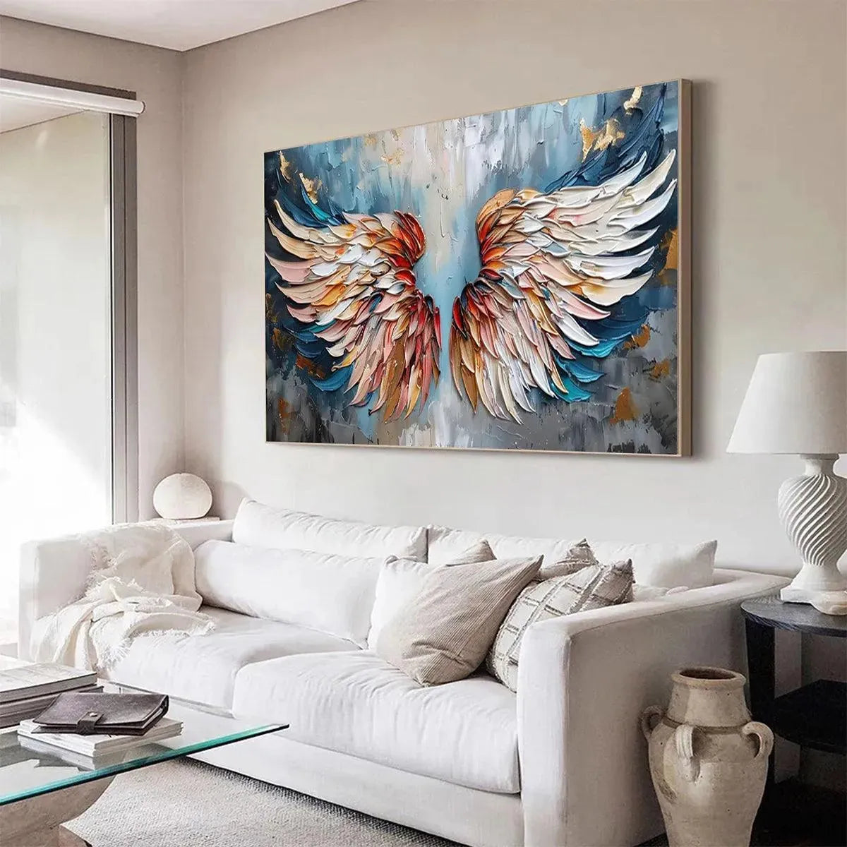 Textured impasto painting of colorful angel wings with gold leaf accents, showcasing vibrant hues and 3D paint texture.