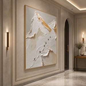 Textured impasto mountain ascent wall art in white, beige and gold framed in gold