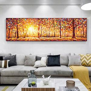 AUTUMN SUNRISE: Panoramic forest painting with warm orange and yellow autumnal foliage and sunlit trees.