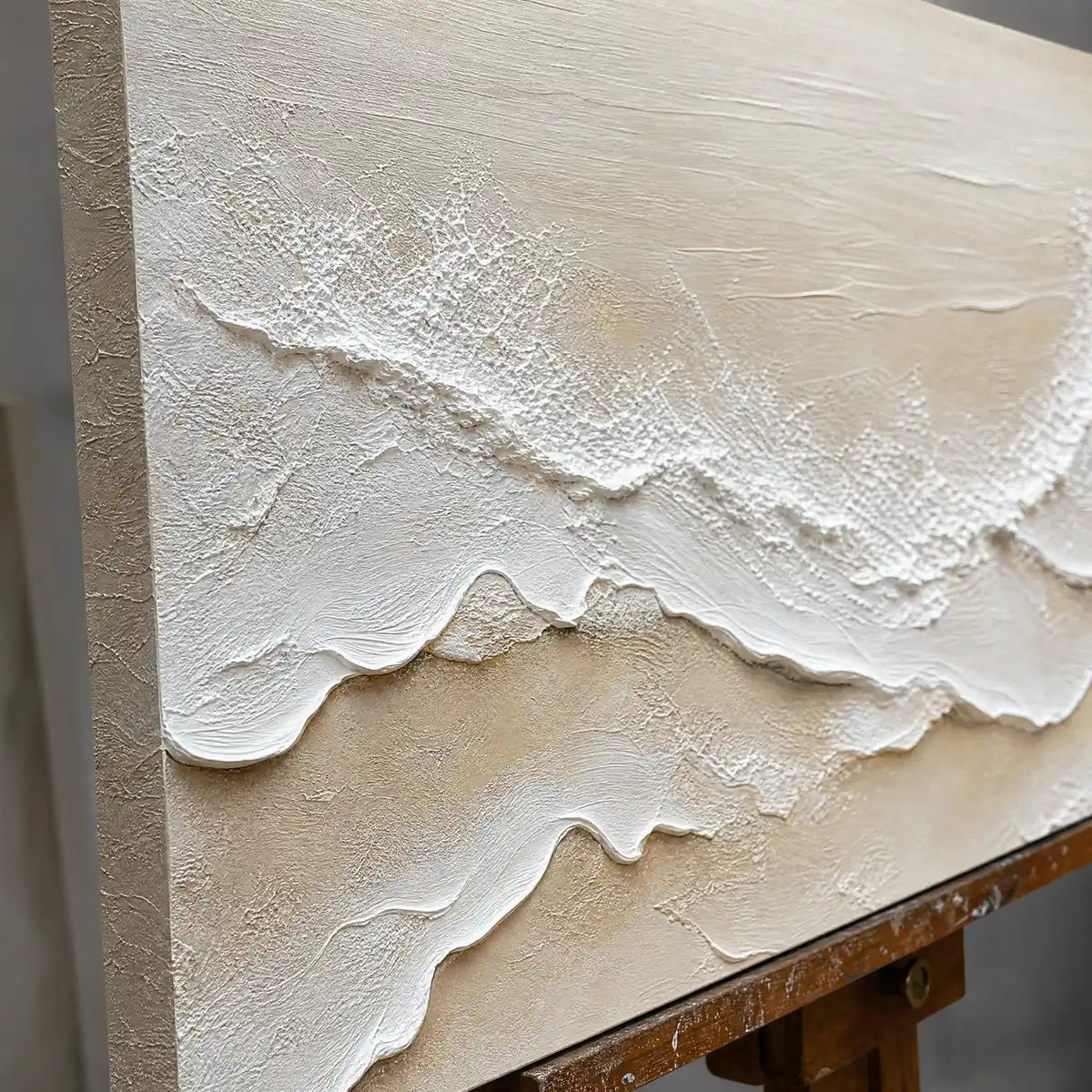 Close-up detail of Ivory Strata showing hand-painted texture and part of the frame