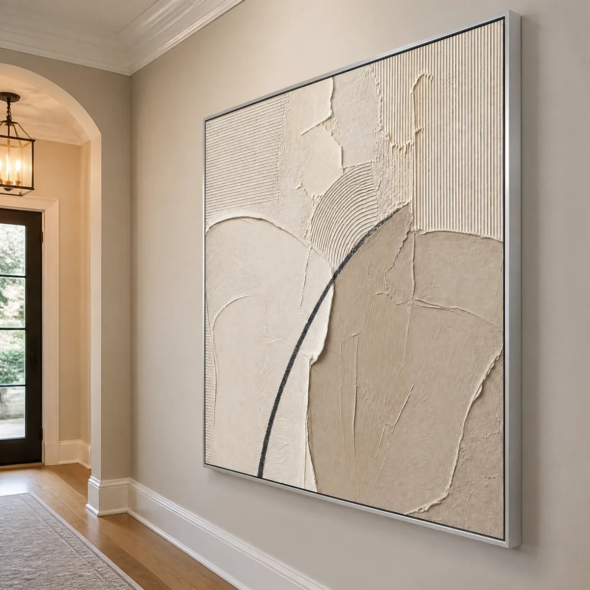 Quiet Contour in a refined entry hall with silver frame