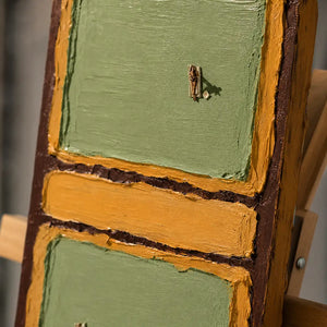 Close-up detail of Twin Fairways showing hand-painted texture and part of the frame