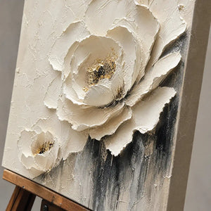 Close-up detail of Ivory Rose Relief showing hand-painted texture and part of the frame