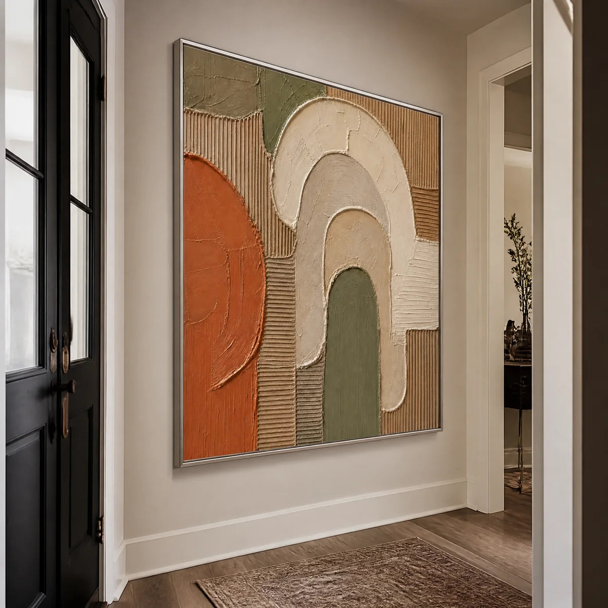 Earthen Archways in a refined entry hall with silver frame