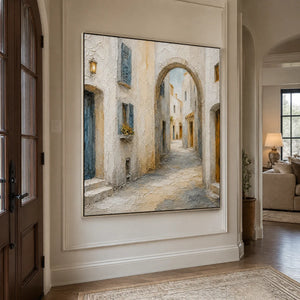 Whitewashed Lane in a refined entry hall with silver frame