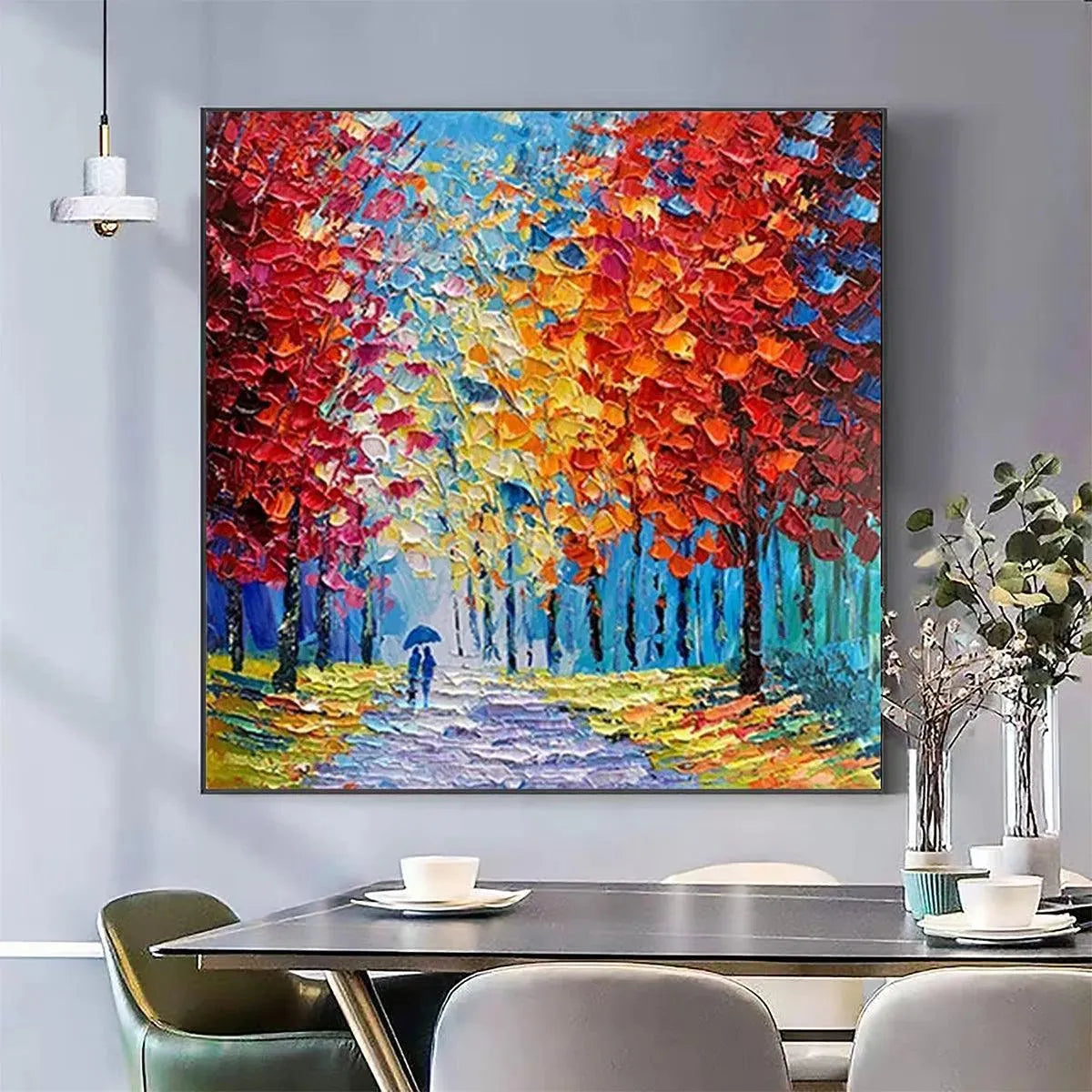 Vibrant 'Autumn Walk' impasto painting of couple in autumn forest, displayed in modern dining room.