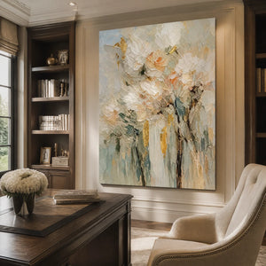 Textured pastel floral abstract painting with blush, cream and gold tones in modern office.