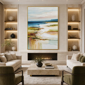 Textured vertical abstract seascape oil painting in gold frame above modern fireplace