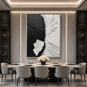 Black and white impasto wall art above a luxury dining table