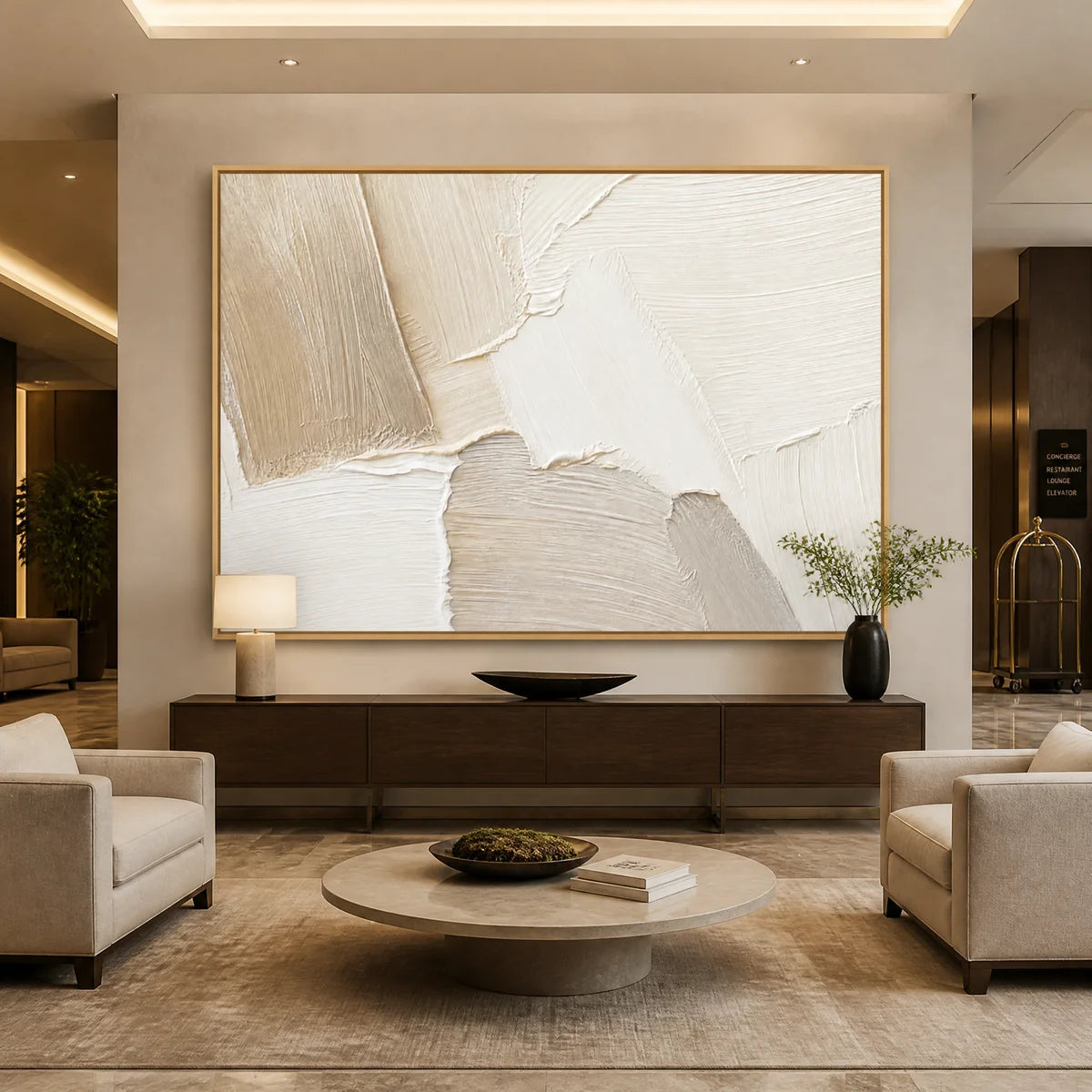 Cream beige abstract wall art with textured oil painting in a modern luxury living room displayed in a luxury hotel lobby.