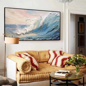 Liam O'Connell 'Cresting Wave' textured seascape painting; dramatic blue ocean wave, white foam, sunset sky, black frame.