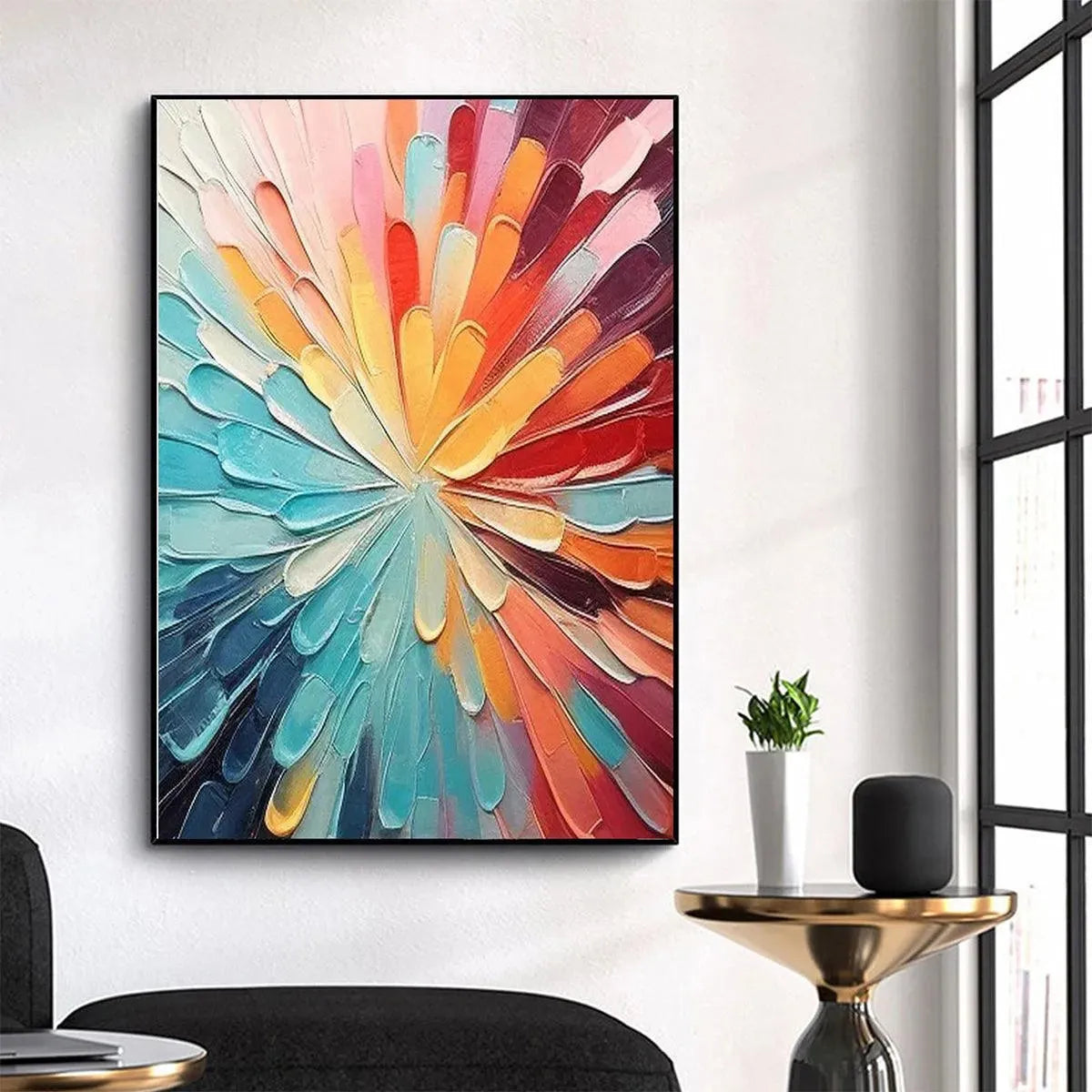 "Colorful Radiance" painting features vibrant impasto texture, radiating strokes, black frame, enhancing modern living room.