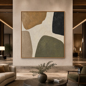 Earthbound Forms abstract wall art with earthy neutral shapes in a wood frame displayed in a luxury hotel lobby.
