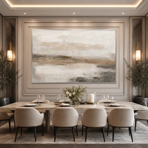 Textured Wabi Sabi abstract landscape painting in beige, white and gray above elegant dining table