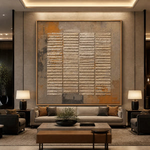 Rustic grid texture abstract wall art in earthy beige and brown tones in a wood frame displayed in a luxury hotel lobby.