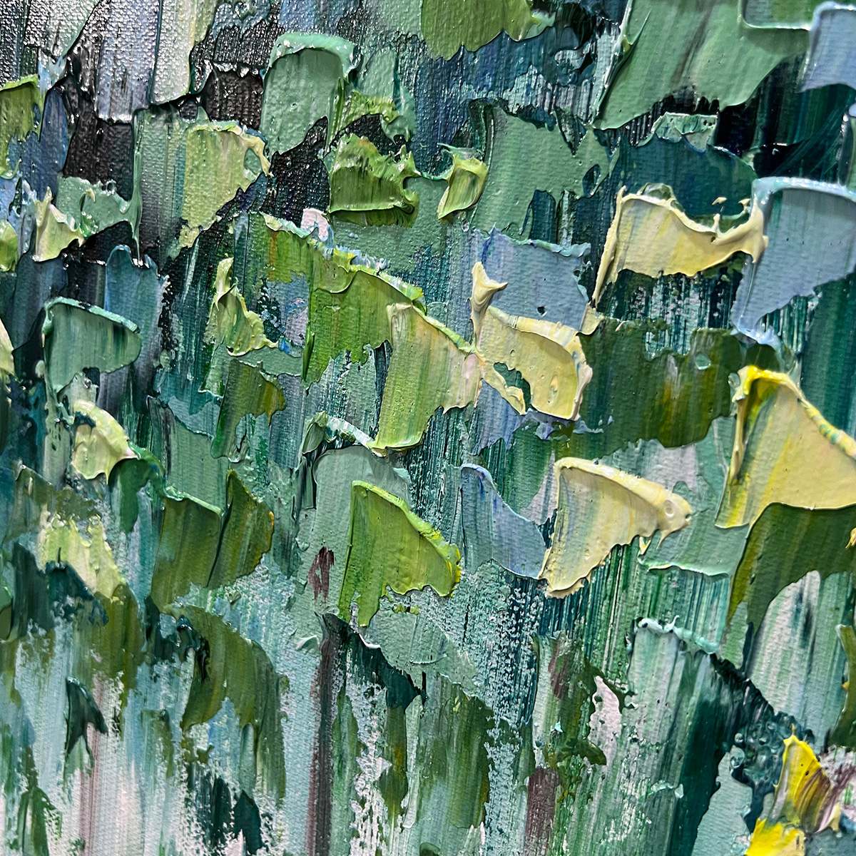 Emerald Forest abstract painting, vibrant green and blue canopy, light tree trunks, framed in sleek black.