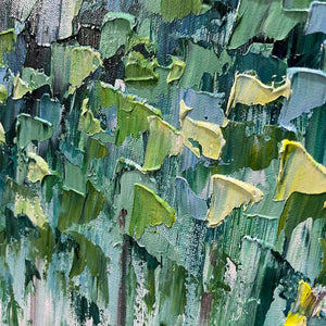 Emerald Forest abstract painting, vibrant green and blue canopy, light tree trunks, framed in sleek black.